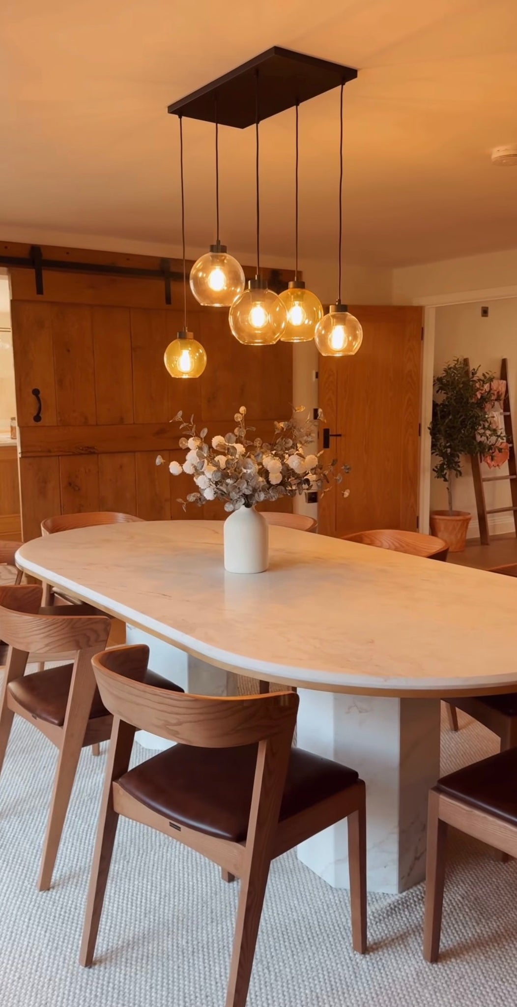 The table shown complemented beautifully by dining chairs from The Wood Bender